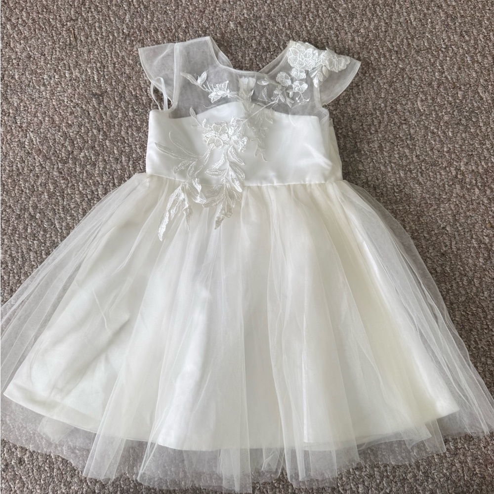 Elegant White Tulle Dress with Floral Details